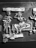 fragments from a carved set, showing human & animal figs., 11th section from left