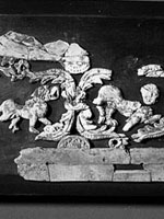fragments from a carved set, 3rd section from left