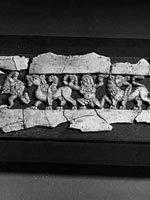 fragments from a carved set, showing human & animal figs., 2nd section from left
