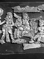 fragments from a carved set, showing human & animal figs., 3rd section from left