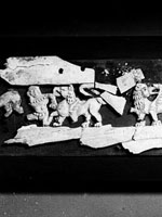 fragments from a carved set, showing human & animal figs., 1st section from left