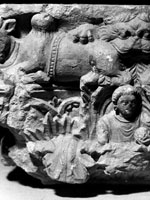 Capital, showing a zebu, a lion, and a human figure, fragment