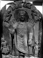 Sumegha (Sumedha) spreading his hair across the ground to protect Dipankara Buddha's feet from the mud