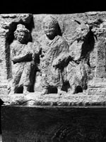 Buddha, standing, in abhayamudra; architectural fragment